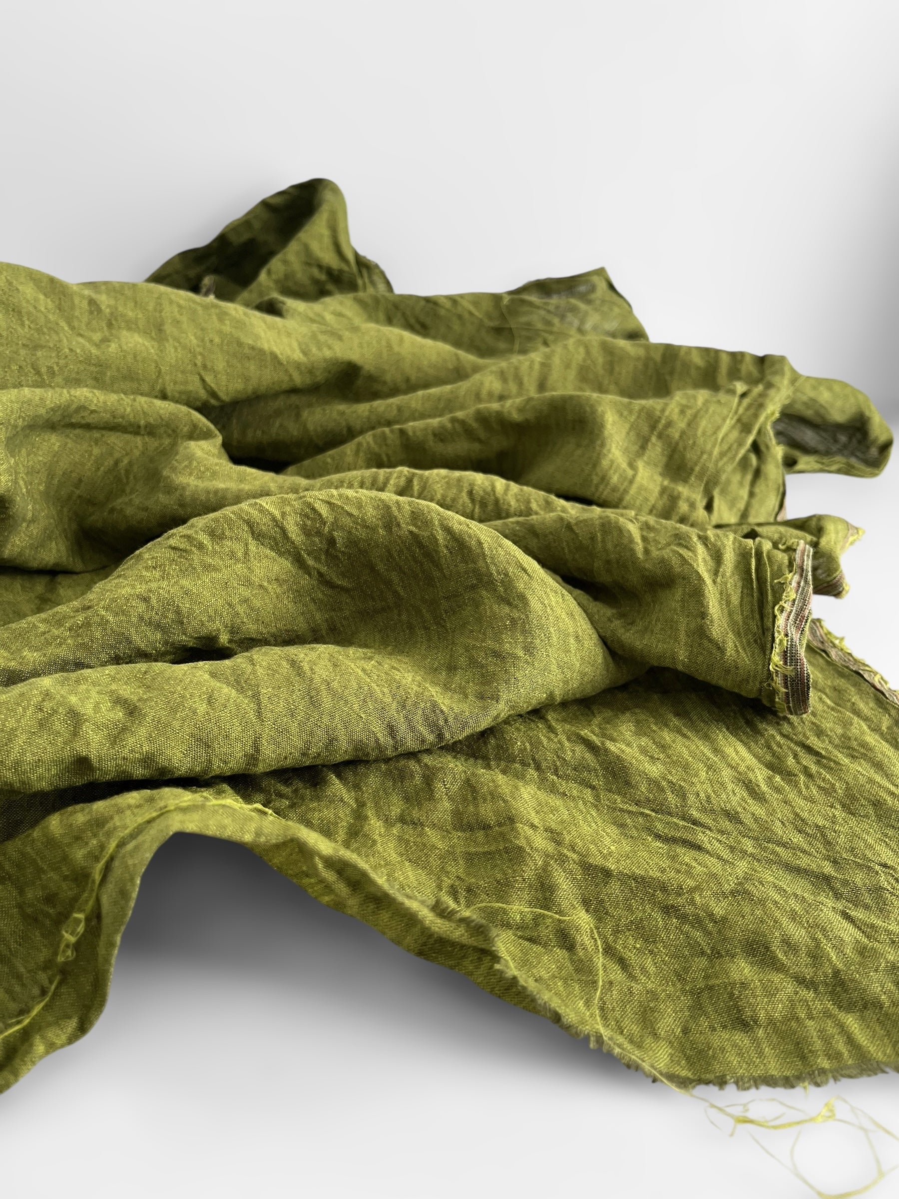 Green fabric on a white background